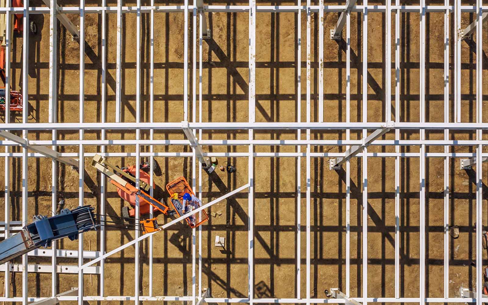 An employee working on an under construction building.