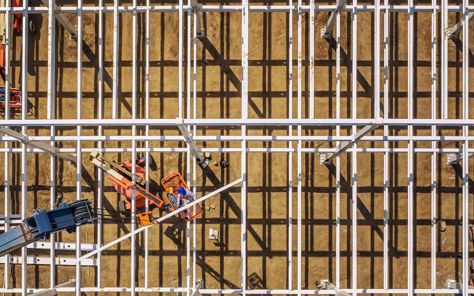 An employee working on an under construction building.